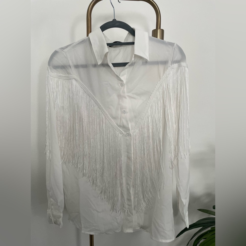 White blouse with fringe